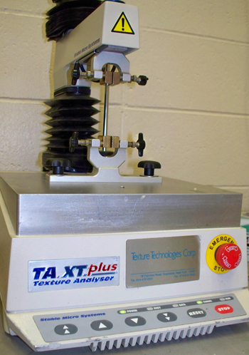 Texture analyzer shown with tensile grips